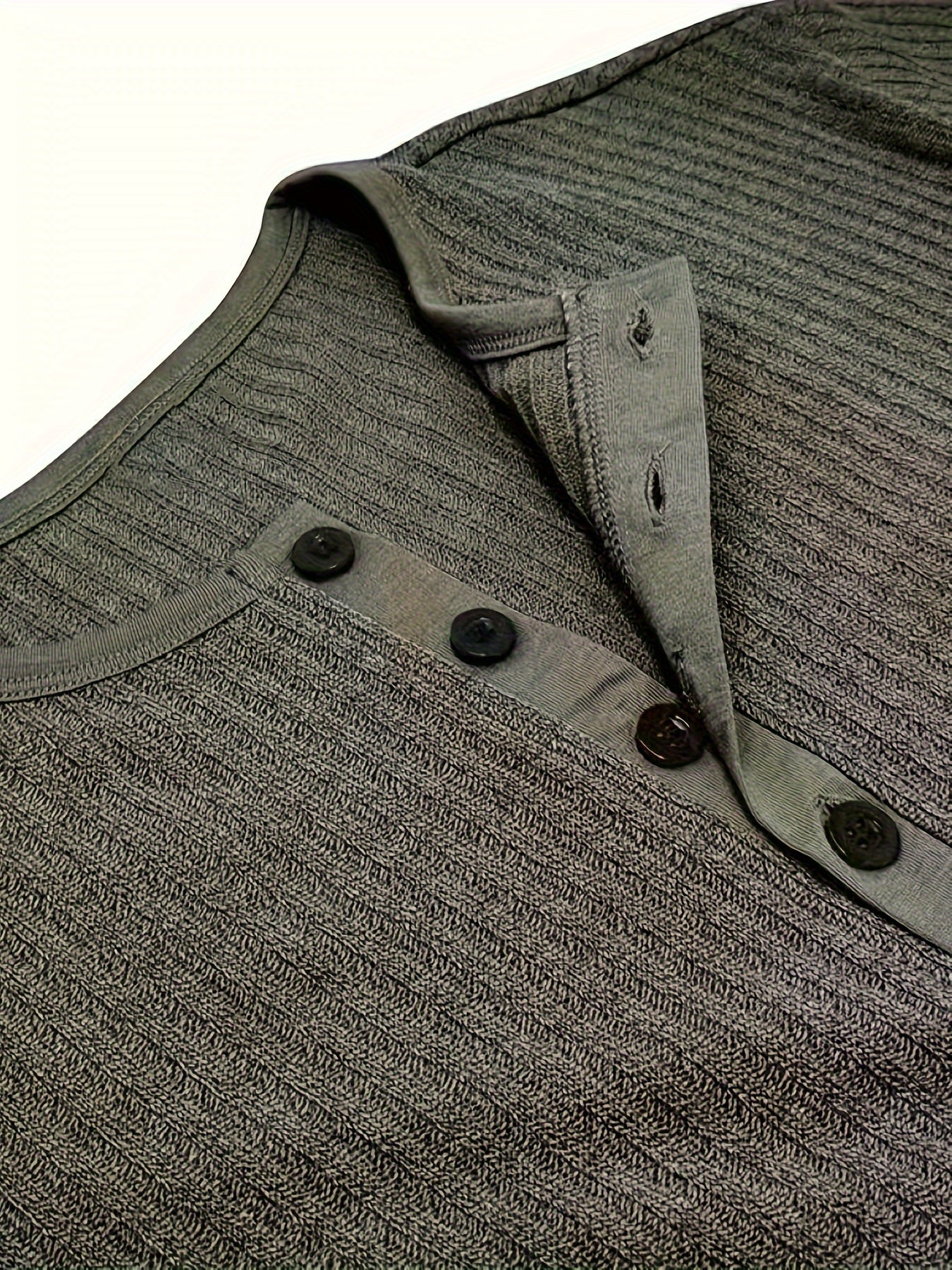 Men’s solid stripe pattern knit short sleeve Henley T-shirt—chic and stylish sports top for summer.








