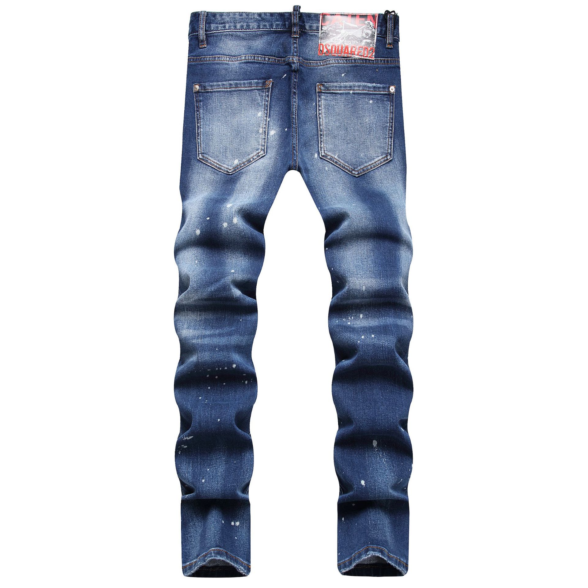 Men’s ripped fashion jeans with ornamental details, slim fit, and distressed design for a trendy streetwear look.
