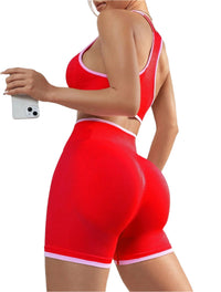Women's seamless sports yoga set with vest and high-waist shaping shorts, perfect for activewear and workouts.








