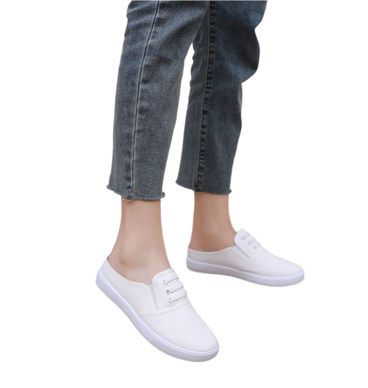 Comfortable slip-on canvas shoes for women with a flat sole, breathable upper, and versatile style, perfect for casual outings.








