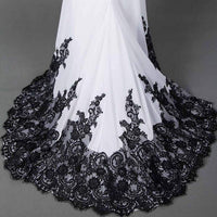 A slim mermaid wedding dress with a figure-flattering silhouette and flowing tail, designed for an elegant and timeless bridal style.

