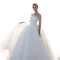 “Forever Yours Mesh Long Sleeve Embroidered Wedding Dress – romantic mesh bridal gown with embroidered details and long sleeves – Hot Deal Warehouse bridal”

