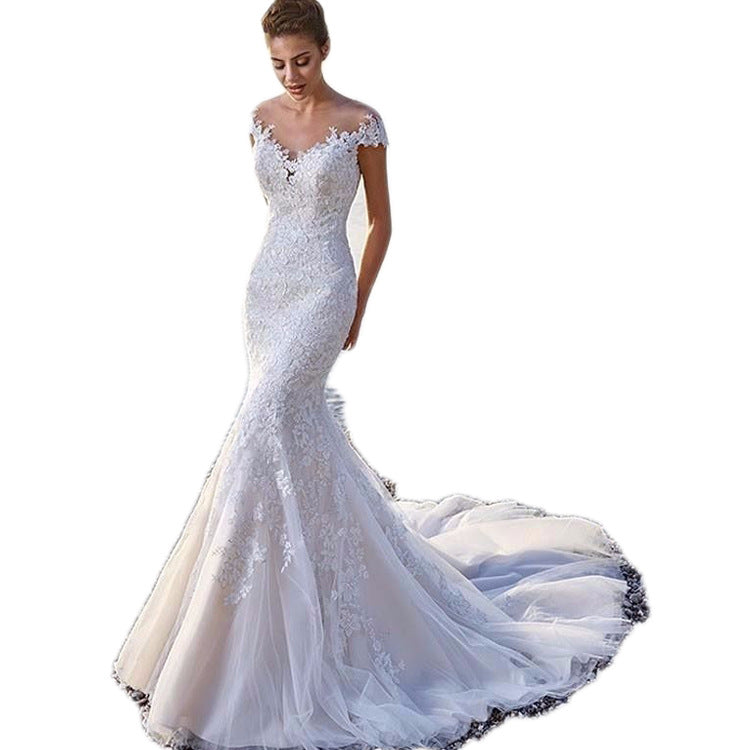 “Enchanted Mermaid Wedding Dress – magical bridal gown with mermaid silhouette and enchanting details, perfect for a fairytale wedding – Hot Deal Warehouse bridal fashion”

