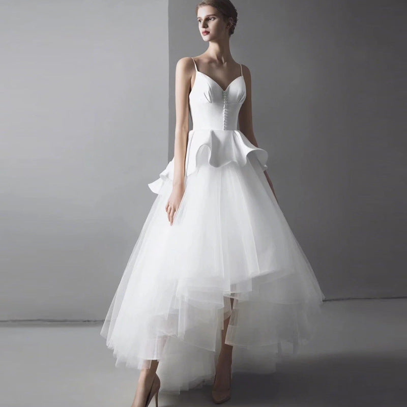 Elegant plus-size wedding dress with lace detailing and a flattering silhouette for modern brides.


