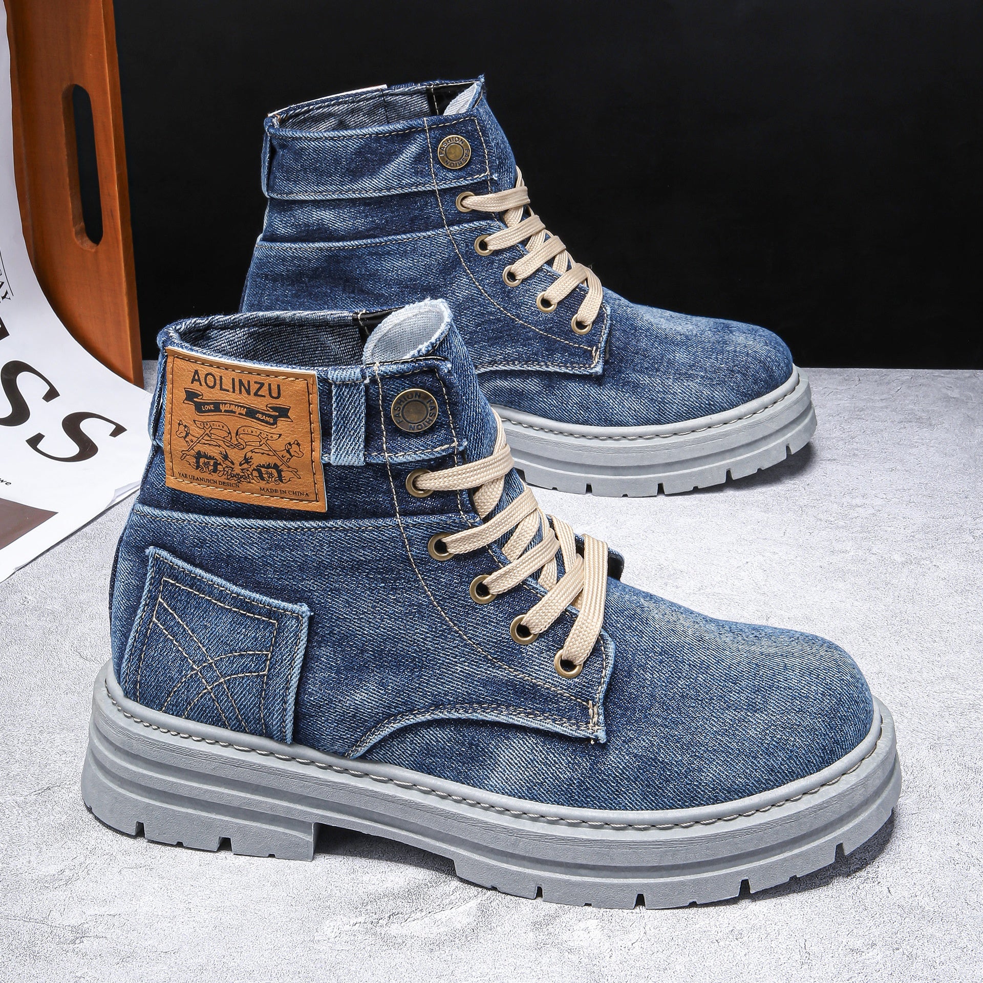 High-top denim board shoes for men with lace-up design and rubber sole.

