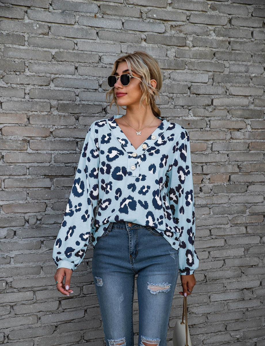 Women's long-sleeve V-neck top with a bold leopard print pattern, perfect for adding a touch of fierce fashion to your wardrobe.








