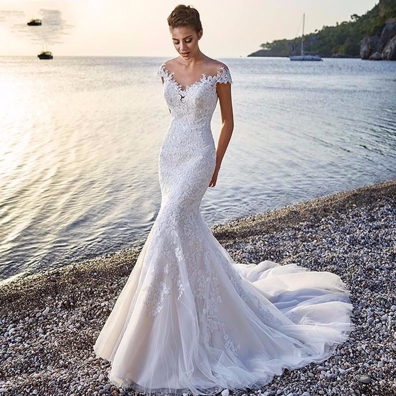 “Enchanted Mermaid Wedding Dress – magical bridal gown with mermaid silhouette and enchanting details, perfect for a fairytale wedding – Hot Deal Warehouse bridal fashion”

