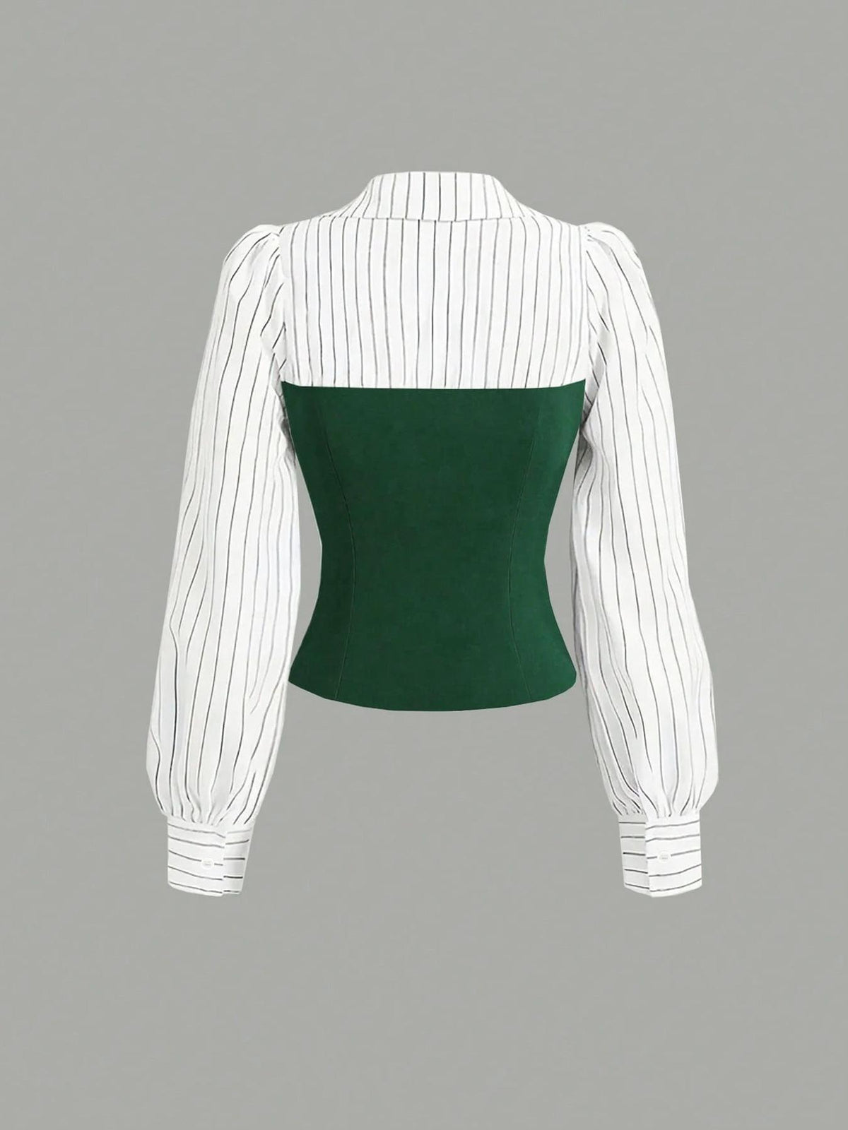White pinstripe blouse with a green bodice on a gray background