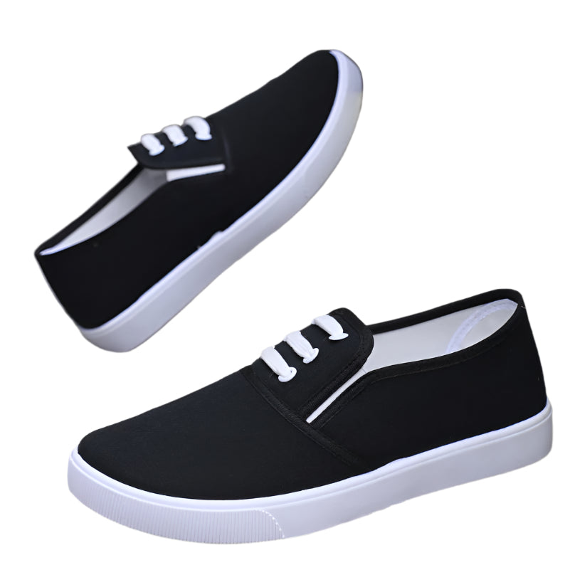 Comfortable slip-on canvas shoes for women with a flat sole, breathable upper, and versatile style, perfect for casual outings.








