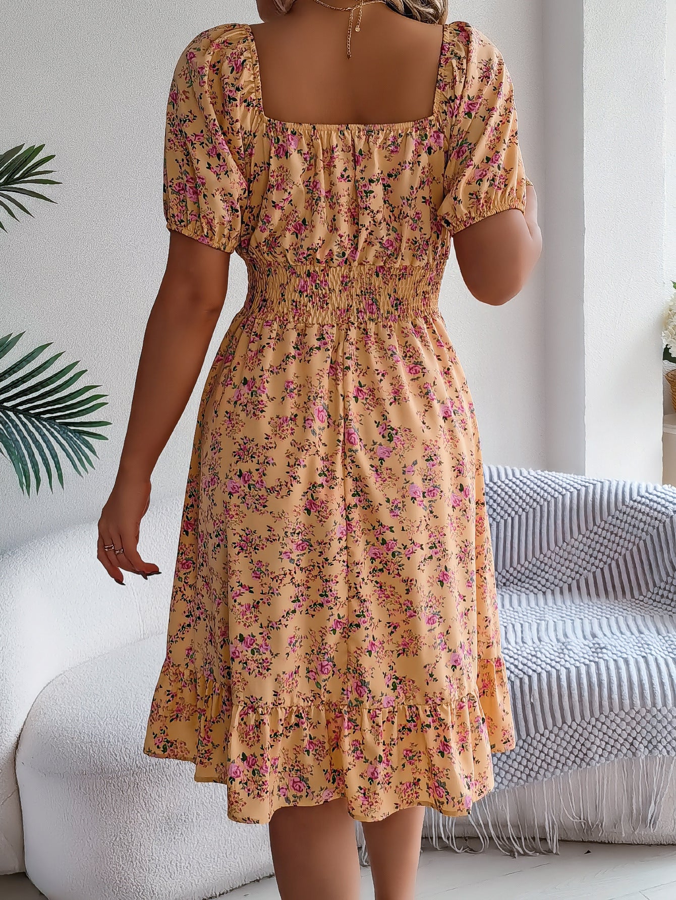 Women's floral print square collar dress with ruffle details, perfect for summer fashion and casual outings.

