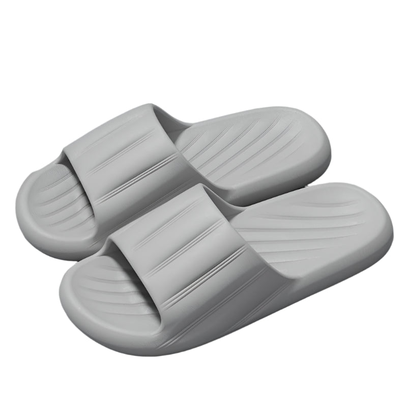 Unisex striped home slippers with thick soles and non-slip bottoms in solid colors.

