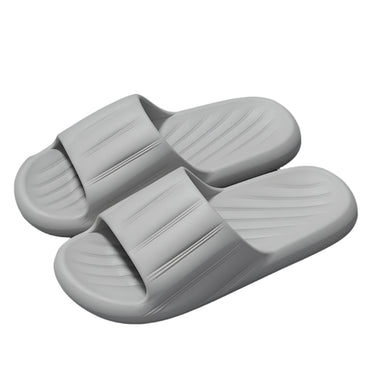 Unisex striped home slippers with thick soles and non-slip bottoms in solid colors.

