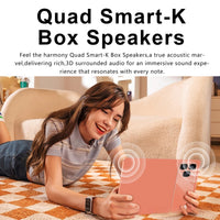 Person lying on the floor using a tablet with Quad Smart-K Box Speakers in the background