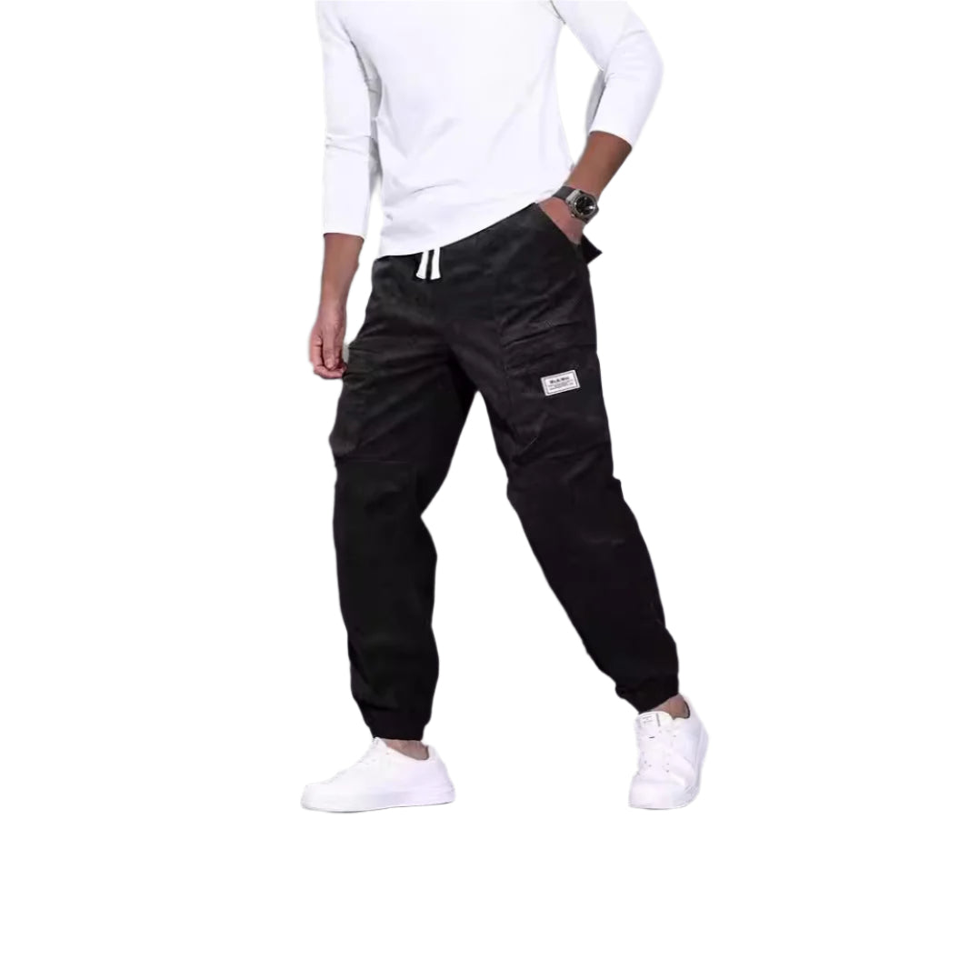 Men's corduroy overalls with ankle-tied loose fit and multi-pocket design for casual wear.