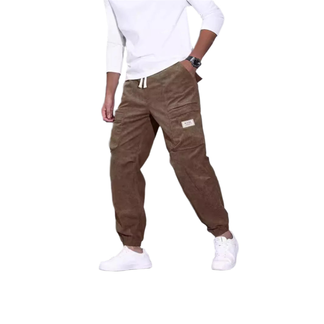 Men's corduroy overalls with ankle-tied loose fit and multi-pocket design for casual wear.