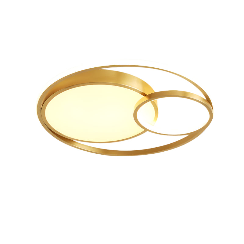 Modern Nordic-style nested round chandelier hanging in a minimalist living room

