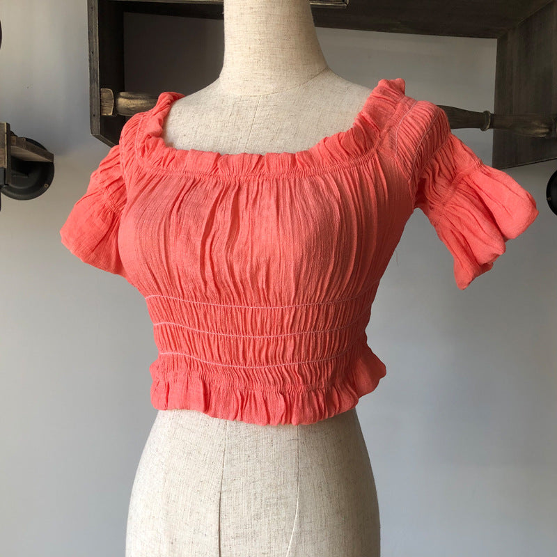 Women's off-shoulder swimsuit top, beach bikini with slubbed fabric, breathable and stylish vacation swimwear.








