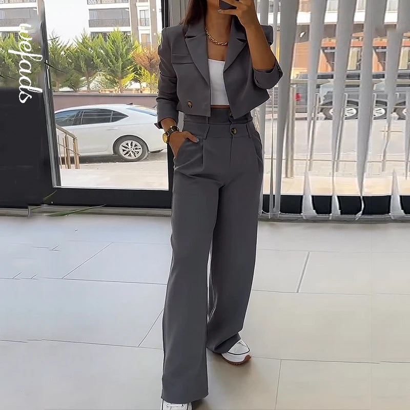 Women's fashion two-piece suit, stylish top and casual pants set, breathable and comfortable outfit for everyday wear.








