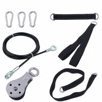 A pulley system kit with a black cable, a silver metal pulley block, three silver carabiners, and several black webbing straps with metal rings, arranged on a plain white background.